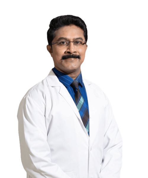 Dr. Roopesh N, gynecologic onco-surgeon, in a white coat